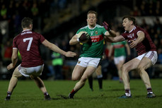 Donal Vaughan is tackled by Johnny Heaney and Thomas Flynn 2/3/2019