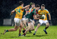 Niall McGovern and Conor Gallagher tackle Fionn McDonagh 10/1/2018