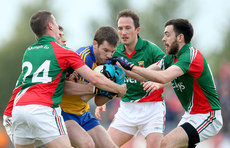Mikey Sweeney, Jason Doherty, Alan Dillon and Kevin McLoughlin tackle Niall Carty 8/6/2014