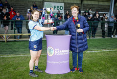 Marie Kearney presents the Division 3B Cup to Dublin captain Niamh Gleeson 23/3/2024