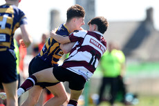Conall Mollloy is tackled by Mark Naughton 21/4/2024