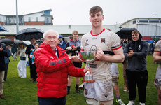 Jason Aherne is presented with the trophy by Ger McNamara 28/4/2024