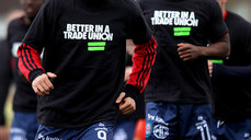 Bohs warm up in t-shirts supporting trade unions 26/4/2024