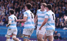 Michael Walsh, Niall Smyth and Patrick Moore celebrate after their team scores a try 17/3/2024