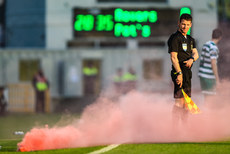 A linesman points towards a flare 15/5/2023 