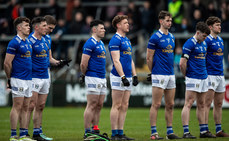 The Cavan team stands for a minute silence 16/3/2024