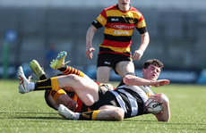 Tom Sheehan is tackled by Ronan O'Connor 21/4/2024