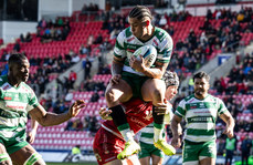 Jacob Umaga is tackled in the air by Tom Rogers 23/3/2024
