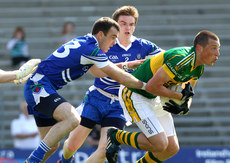 Kieran Donaghy tackled by John Paul Mone and Dessie Mone11/4/2010