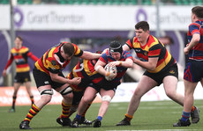 Sean Maughan is tackled by Sean Wynne and Matthew Gallagher 24/3/2024