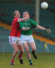 Paidi Ahern is tackled by Richard O'Sullivan 16/1/2011