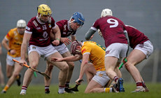 Aaron Craig, Conor Gaffney, ,Eoin Keyes and Shane McGovern tackle Eoghan Campbell 9/3/2024