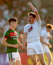 Conor Loftus dejected as Kildare's David Hyland celebrates at the final whistle 30/6/2018