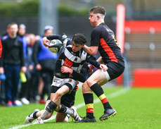 Bobby O'Callaghan is tackled by Daniel O'Connell and Daniel O'Flaherty 22/3/2023