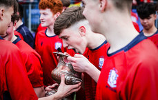 CUS players celebrate with the Fr. Godfrey Cup 14/3/2024
