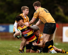 Julian Leszczynski is tackled by Mickey Hanley, Leo MacFarlane and Stevie Mannion 9/3/2024