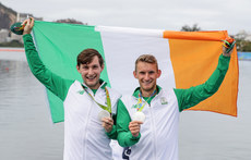 Paul and Gary O'Donovan celebrate with their silver medals 12/8/2016
