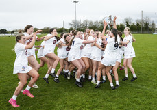 The Kildare team lift the trophy 28/4/2024
