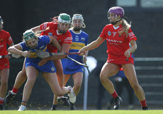 Aoife Barrett and Meadhbh Ring tackle Sinead Meagher 23/3/2024