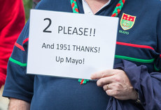 A view of a Mayo fan holding a sign for tickets 17/9/2017
