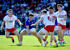 Oisin Brady is surrounded by Tyrone players 21/4/2024