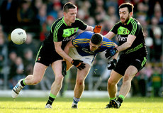 Stephen Coen and Kevin McLoughlin tackle Paul Geaney 1/2/2015
