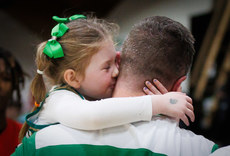 Cora Kelleher, aged 5 from Cork, hugs her dad and Ireland head coach Paul Kelleher after the game 27/3/2024