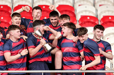 Fionn Barry celebrates with the trophy 26/3/2023