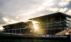 The sun sets on Cheltenham during the final race 15/3/2024