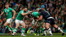 Robbie Henshaw with Caelan Doris as he is tackled by Rory Darge ad Zander Fagerson 16/3/2024