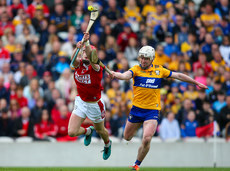 Adam Hogan attempts to stop Alan Connolly from shooting 28/4/2024