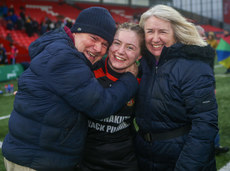 Clodagh McCarthy celebrates with her parents at the end of the game 13/3/2024