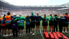 The Ireland backroom staff and coaching team stand for the national anthem 23/3/2024