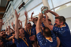 St Vincents players celebrate with the cup 4/5/2024