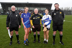 Alan Lagrue and his assistants with Aisling Cussen and Ellie Griffin during the coin toss 13/3/2024