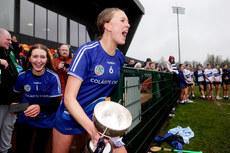 Aisling Cussen celebrates with the trophy 13/3/2024