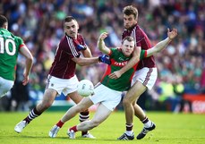 Patrick Sweeney and Paul Conroy tackle Colm Boyle 14/6/2015