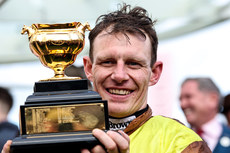 Paul Townend celebrates winning the Boodles Cheltenham Gold Cup Chase with Galopin Des Champs 15/3/2024