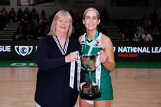 Karen O'Shea is presented with the trophy by Breda Dick 13/4/2024