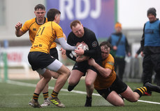 Ian Heanue is tackled by Conor Burns 24/3/2024