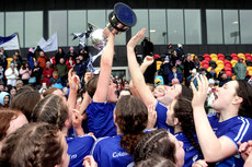 Aisling Cussen and her teammates celebrate with the trophy 13/3/2024