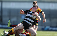 Tom Sheehan is tackled by Ronan O'Connor 21/4/2024