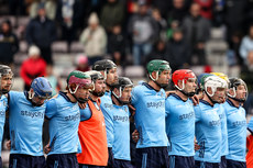 The Dublin team stand for moments silence ahead of the game 10/3/2024
