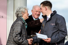 Jackie and Willie Mullins are presented with the Gold Cup after winning with Galopin Des Champs 15/3/2024