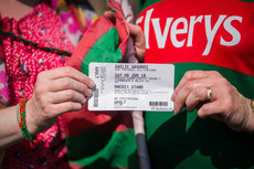 A Mayo fan with their ticket outside the Gaelic Grounds 9/6/2018