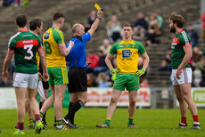 Cormac Reilly issues a yellow card to Aidan O'Shea and Ciaran Thompson 2/4/2017