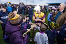 Niall Murphy signs autographs after the game 10/3/2024