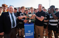Callum Kelly and Danny Reid are presented with the trophy by Michael O’Hehir and Alan Noone 21/4/2024