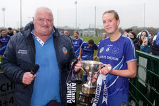 Aisling Cussen is presented with the trophy 13/3/2024