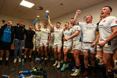 The Cork Constitution team celebrate in the changing room after the game 28/4/2024